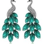 Swiss Zircon Peacock Earings Fashion Earrings for Girls and WomenColor: Green Material: Silver Plated It is advisable to store jewellery in a zip lock pouch (air tight pouch), keep away from water perfume and other chemicals and clean it with dry and soft cloth Aaa swiss zircon stud Lead and nickel free as per international standards Hi quality plating for long lasting finish