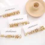24 pairs Combo Celebrity Inspired Trendy Latest Stylish Gold Plated Geometric Twist Pearl Hoop Dangle Earrings for Women and Girls - Image 2
