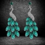 Swiss Zircon Peacock Earings Fashion Earrings for Girls and WomenColor: Green Material: Silver Plated It is advisable to store jewellery in a zip lock pouch (air tight pouch), keep away from water perfume and other chemicals and clean it with dry and soft cloth Aaa swiss zircon stud Lead and nickel free as per international standards Hi quality plating for long lasting finish - Image 2